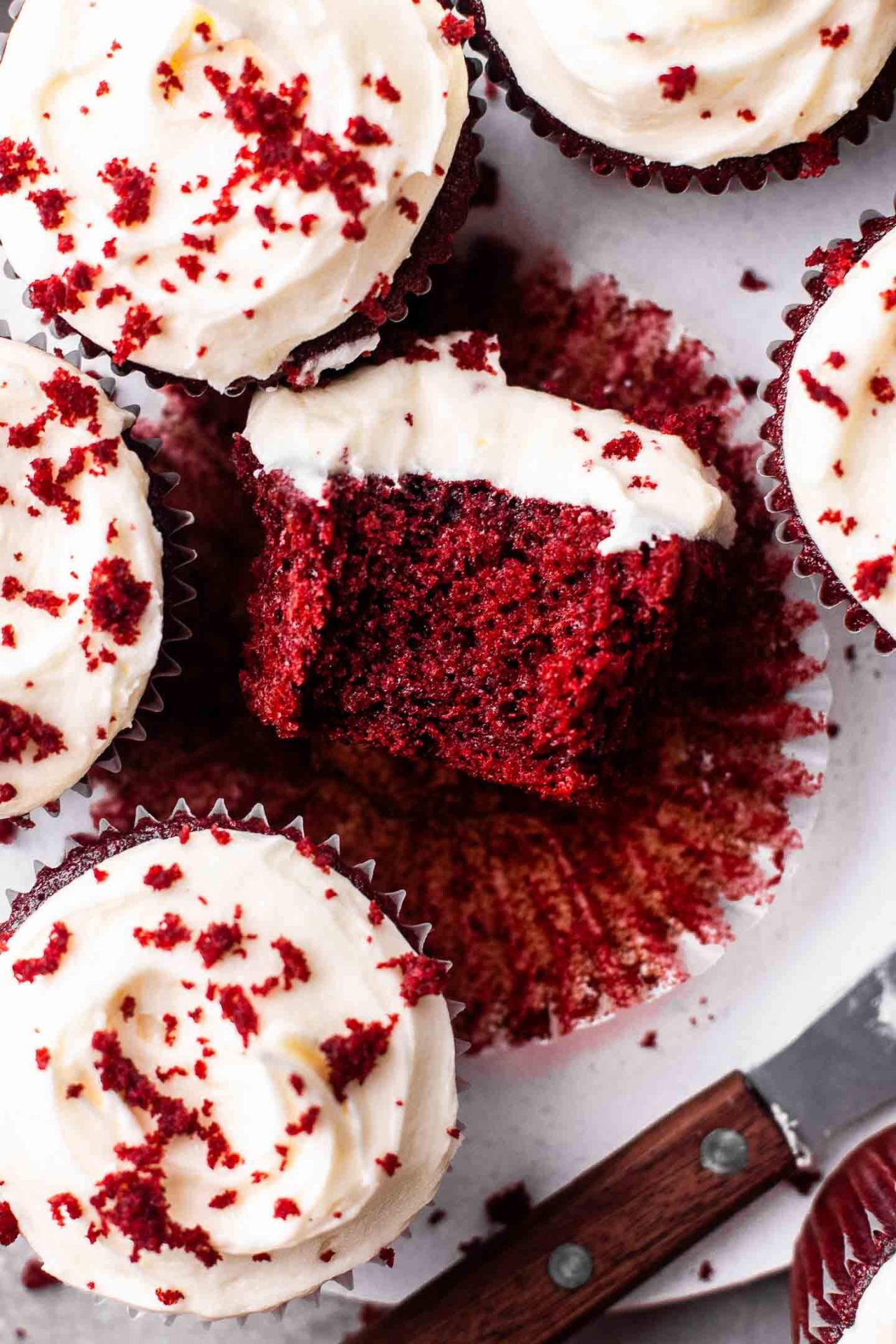 frosted red velvet cupcakes on serving board-1-4