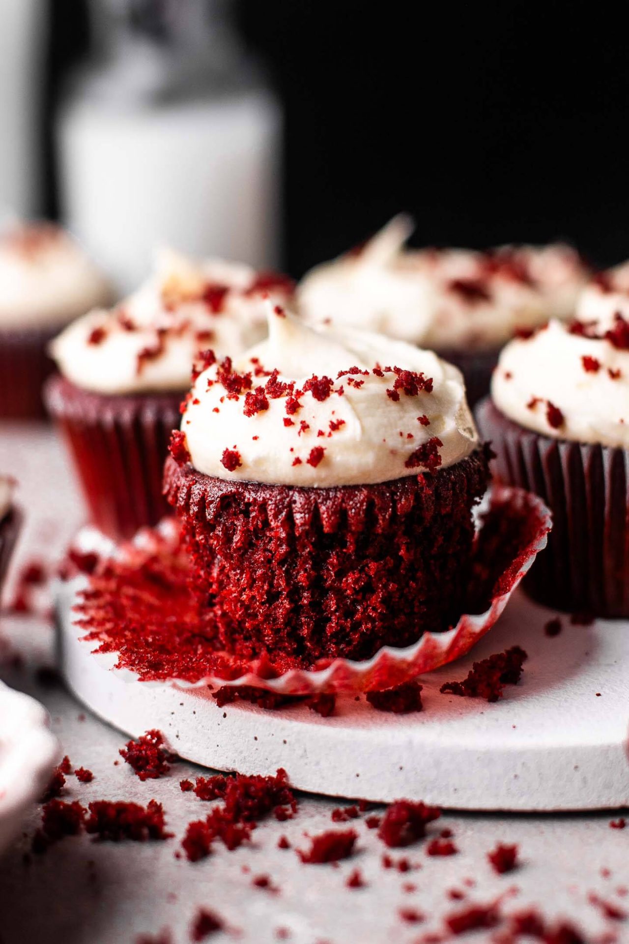 frosted red velvet cupcakes on serving board-3