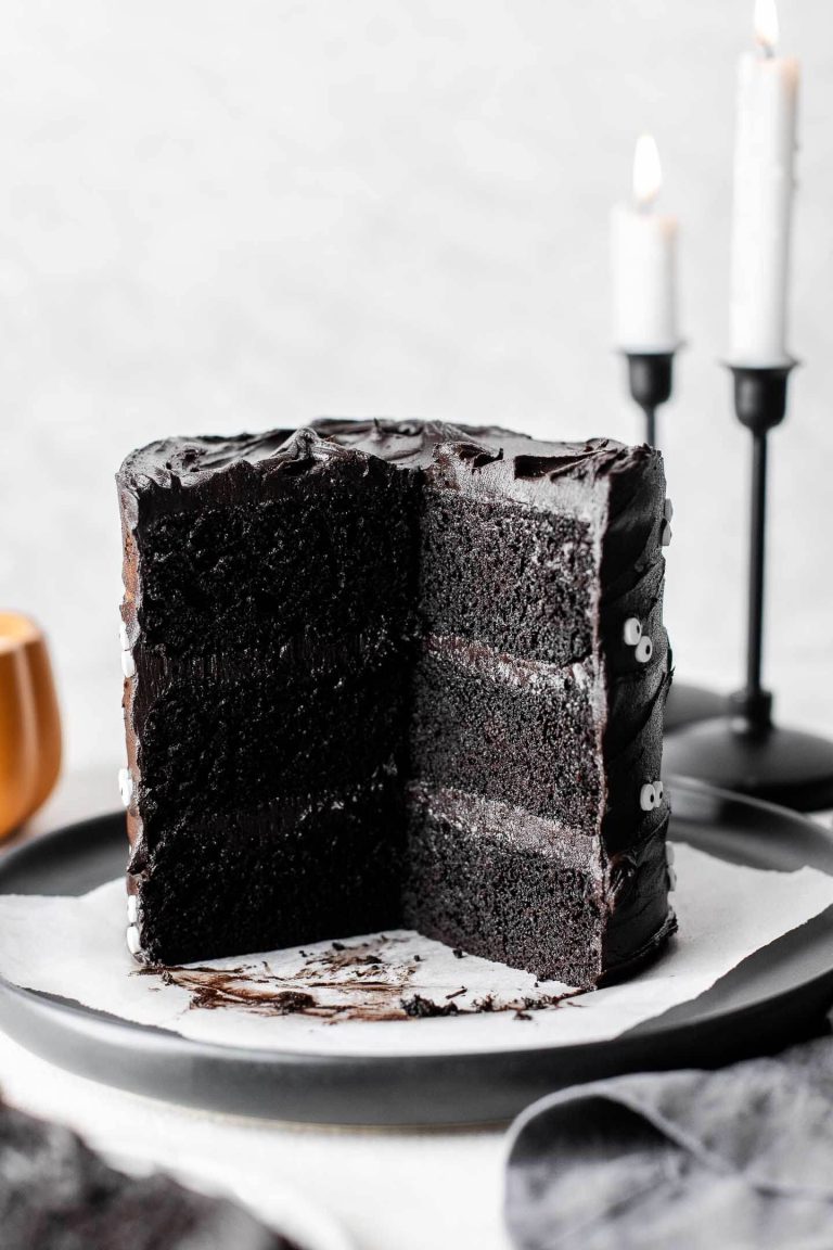 sliced black velvet cake on serving plate