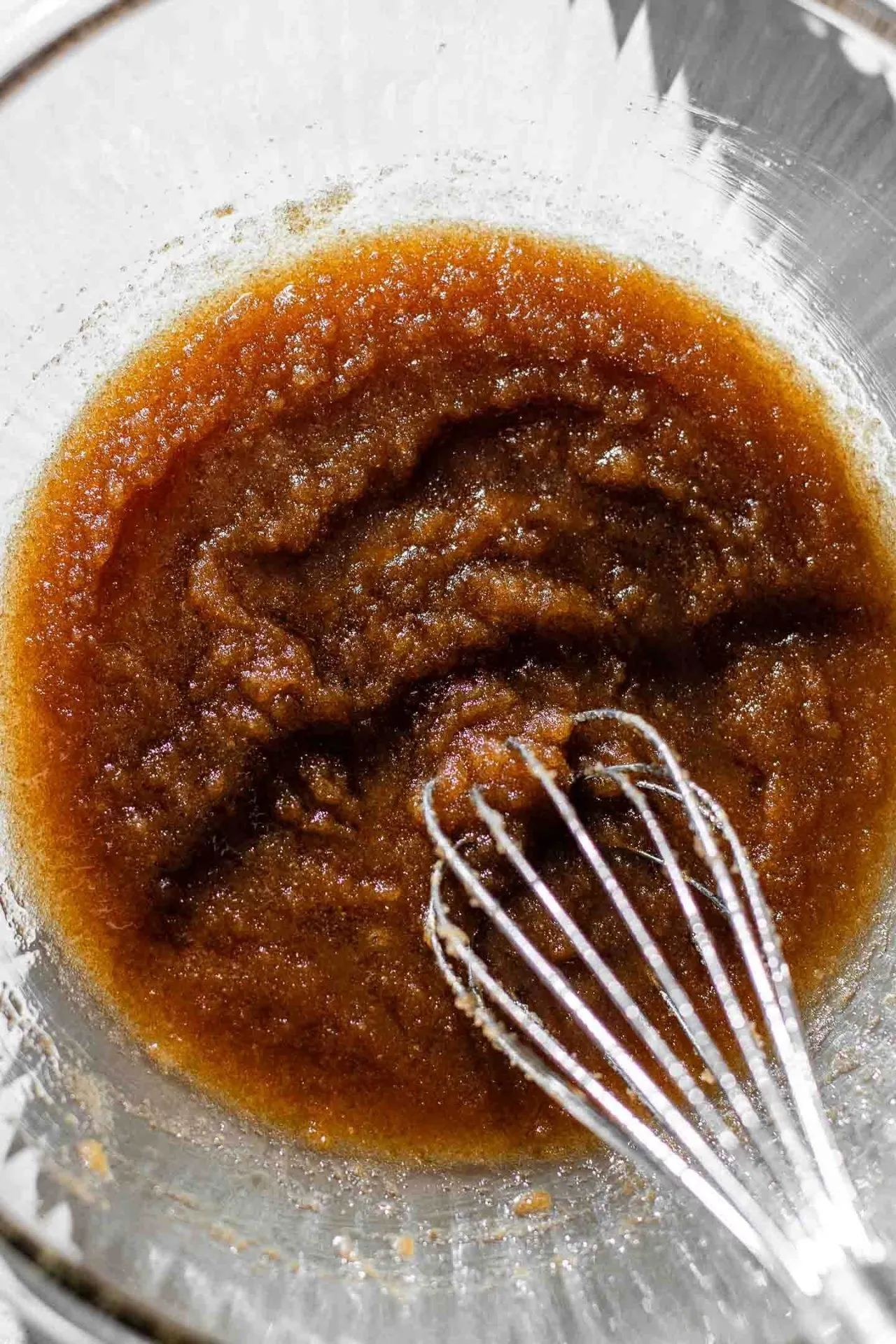 chewy pumpkin cookies brown butter and sugars whisked together in bowl