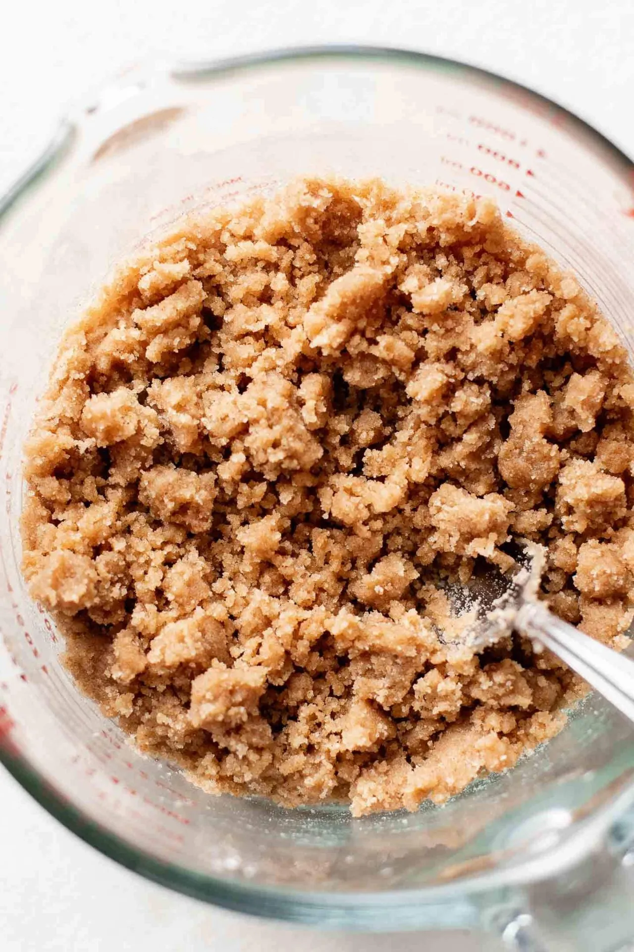 pumpkin coffee cake streusel mixed together in bowl