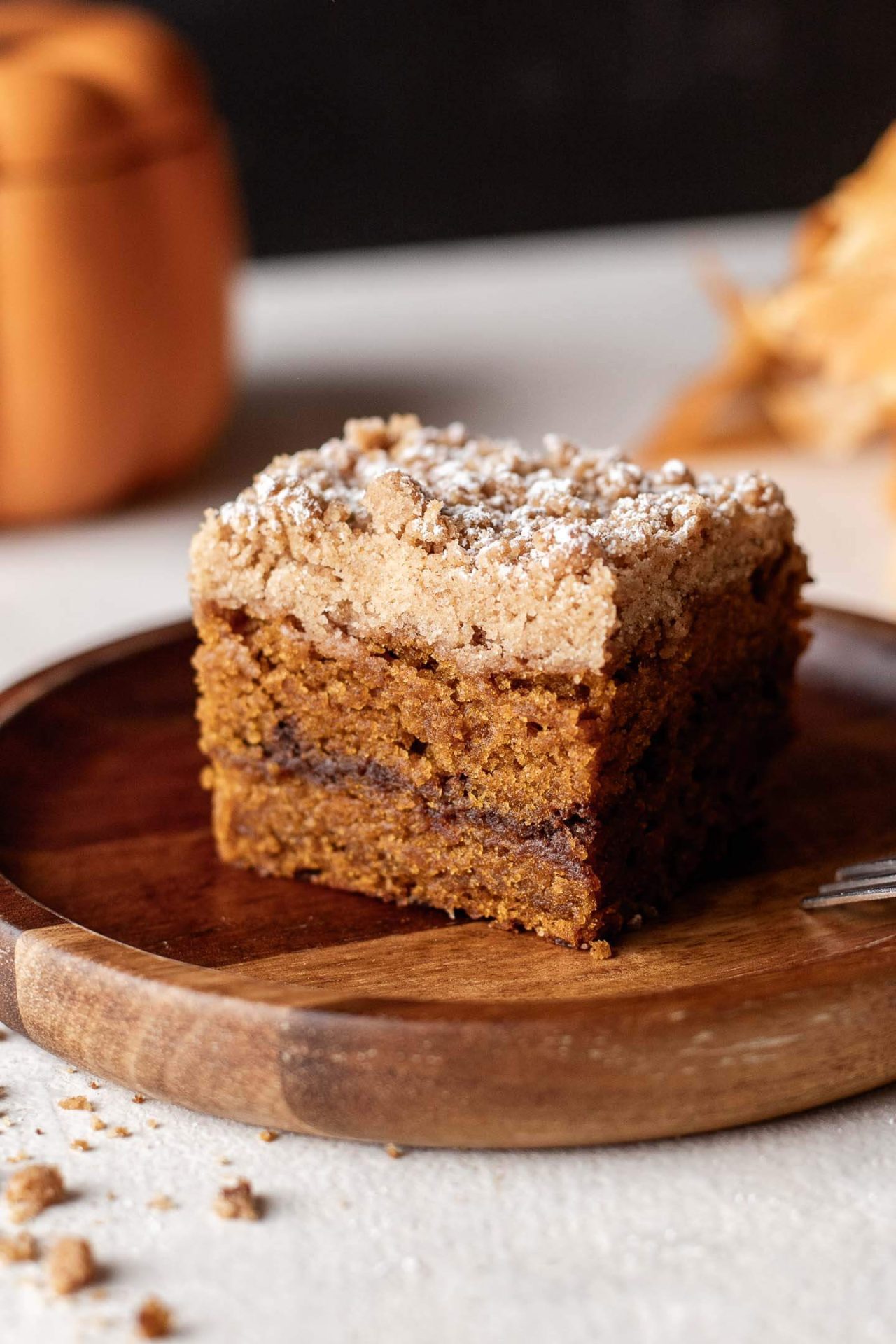 slice of sliced pumpkin coffee cake in plate