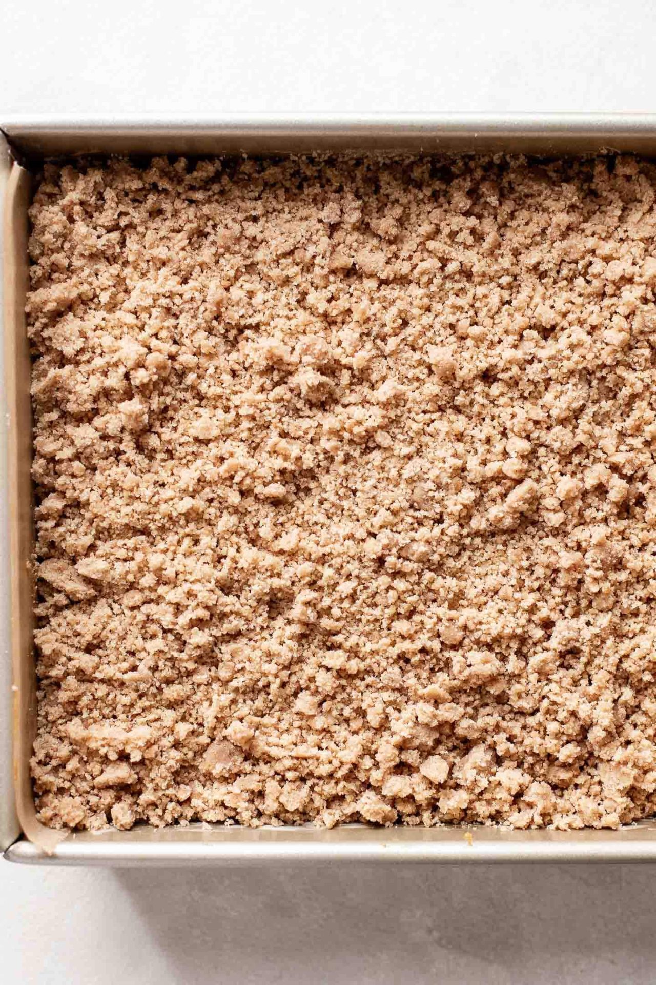 pumpkin coffee cake fully layered in pan
